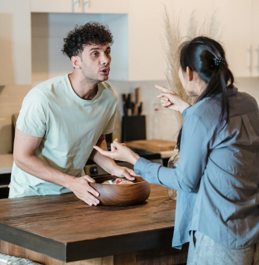 A couple arguing in their home